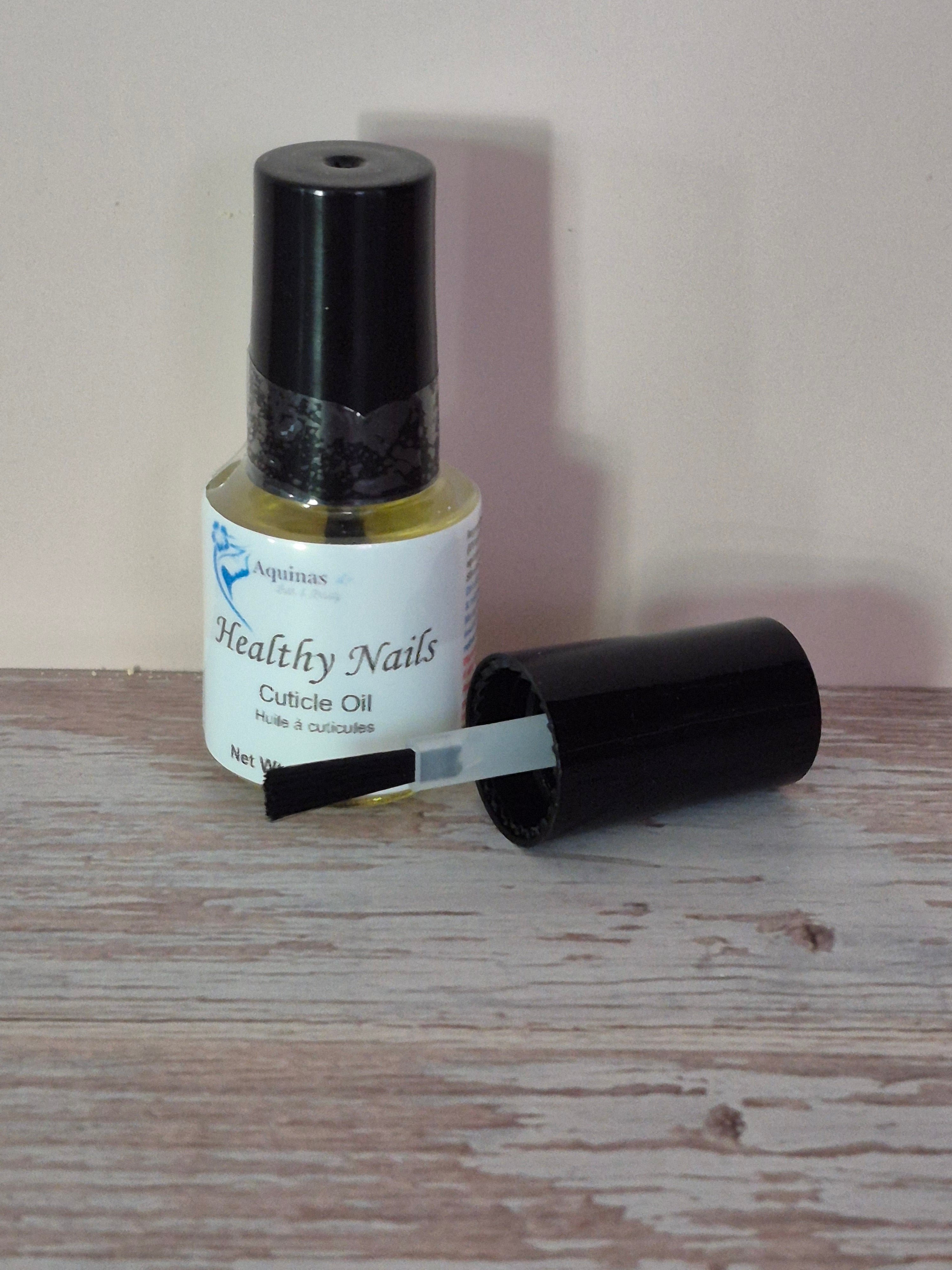 Cuticle oil for healthy nails and soft cuticles | Natural cuticle oil for nail growth and repair | Hydrating cuticle oil for dry and damaged nails | Nail care oil for strong and shiny nails | Moisturizing cuticle oil for smooth cuticles | Daily cuticle oil for nail strength and growth | Lightweight cuticle oil for non-greasy nail care | Cuticle treatment oil for brittle and weak nails | Nail and cuticle oil for manicure maintenance | Beauty cuticle oil for healthy natural nails